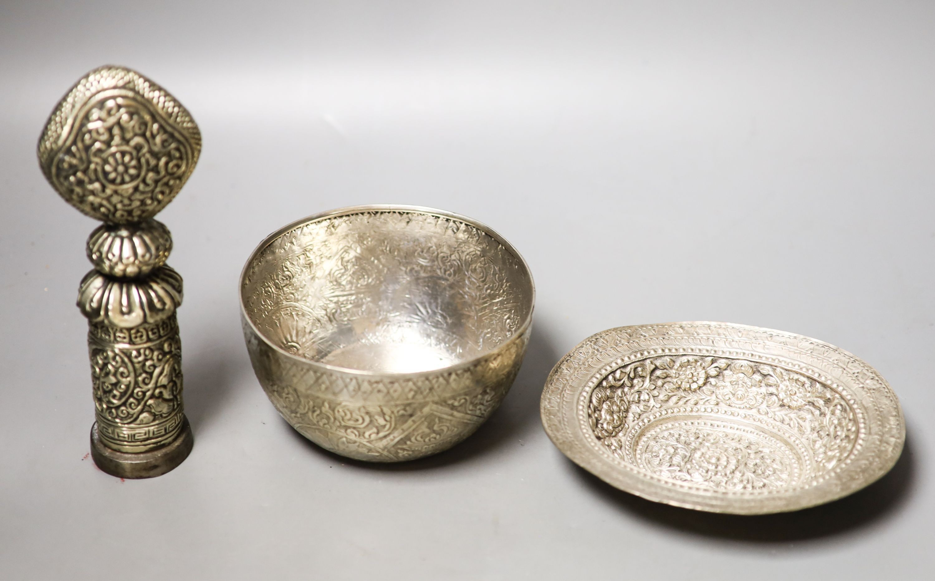 Two Tibetan white metal bowls, similar seal stamp 19cm